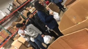 Students carrying food bags