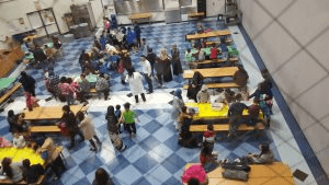 Students and parents engaging in science activities.